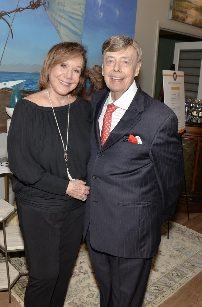 Sonia Gibson and Jim Murphy at the kick off reception for the Ronald McDonald House 12 Good Men luncheon at the Grove Gallery and Interiors showroom.