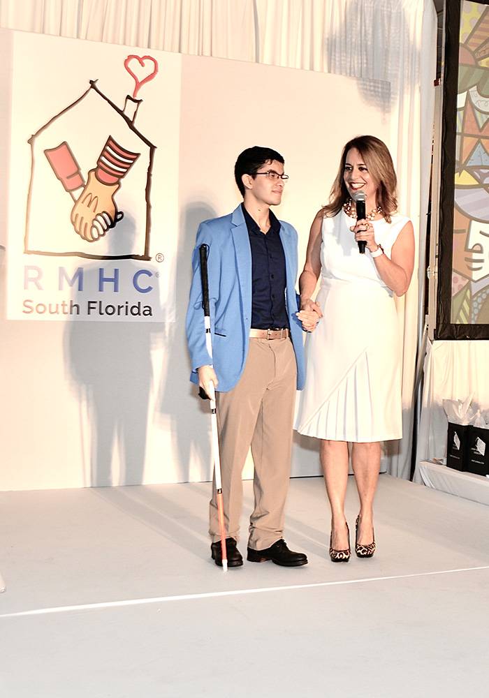 Former RMHC Guest Alfred Cardenas and Executive Director Soraya Rivera Moya