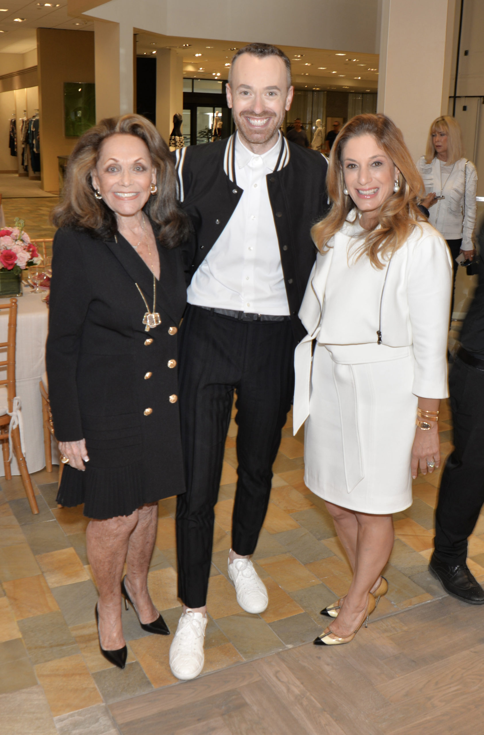 Lola Jacobson, Steven Kravit, and Marisa Toccin Lucas at the Women of Tomorrow Rosé Day kick off luncheon at Neiman Marcus Bal Harbour