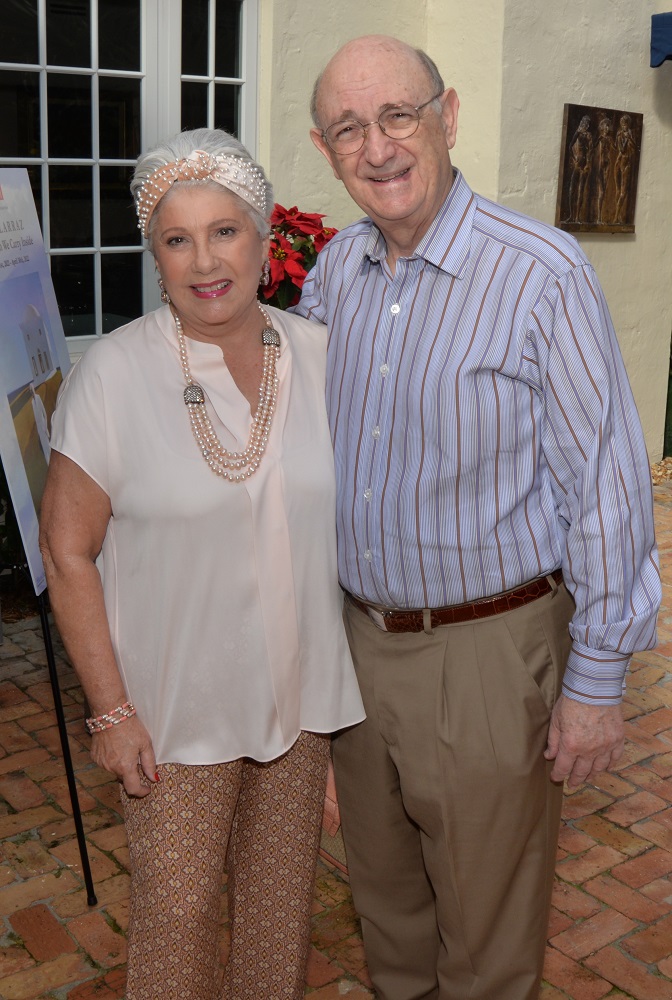 Carmen Betancourt Lewis and Michael Lewis at the Coral Gables Museum Miami Art Week brunch in honor of artist Julio Larraz at the home of Jose Valdes-Fauli