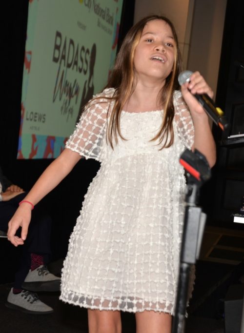 Ten year old singer Isabella Velazquez performs at the Miami Beach Chamber of Commerce Badass Women of the Year Awards luncheon at the Loews Miami Beach