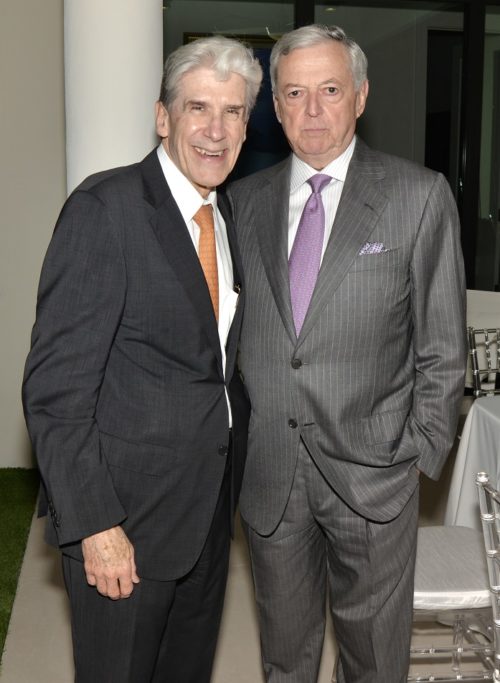 President of University of Miami Julio Frenk and Armando Codina at the US Century Bank dinner in honor of the Council General of Spain, Ambassador Jaime Lacadena, Marquee of La Cadena at the home of Aida Levitan