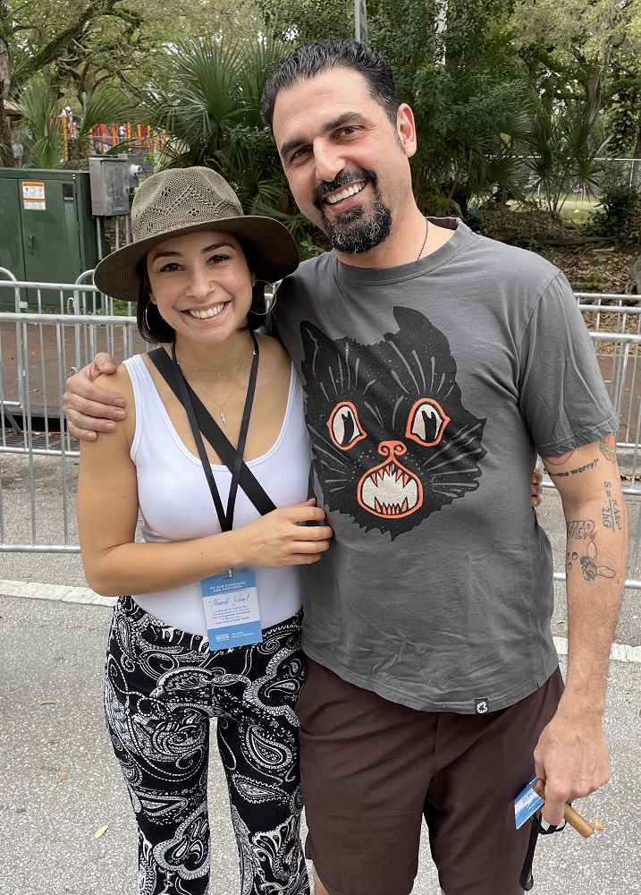 Brenna Mello and artist of this year's poster, Lebo at the 58th Coconut Grove Arts Festival