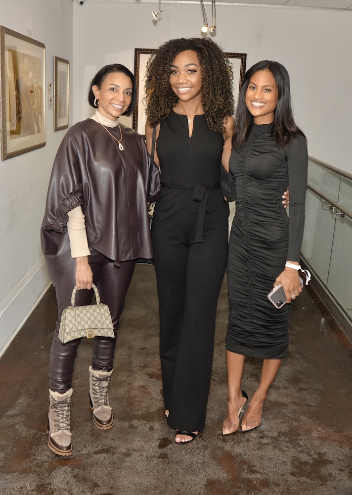 Coyo Robinson, Paris Robinson and Desiree Cross at the exhibit for "Too Black Too Fast" at the Ward Rooming House in Overtown