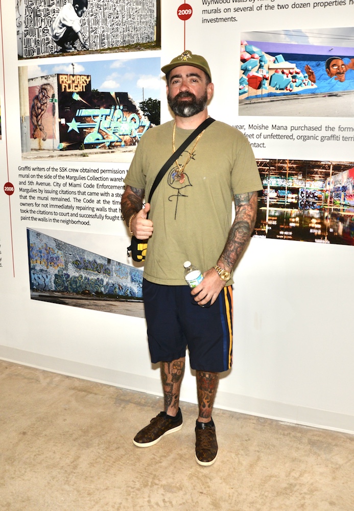 Artist David Anasagasti aka Ahol Sniff's Glue at the opening of the new home of the Museum of Graffiti in Wynwood