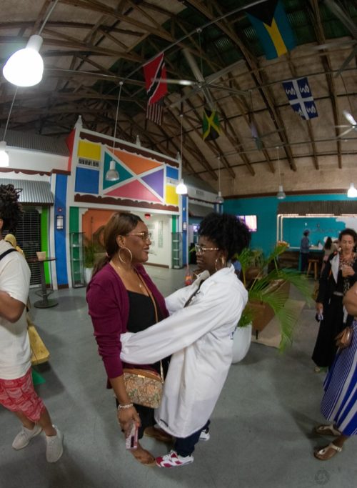 Ruth Burotte greets guests at the Little Haiti Cultural Center