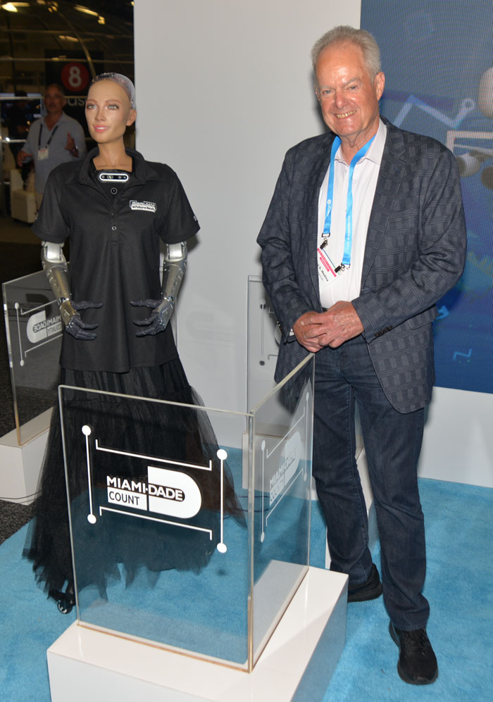 Manny Medina and Miami Dade County AI robot Sofia at eMerge Americas 2022 at the Miami Beach Convention Center