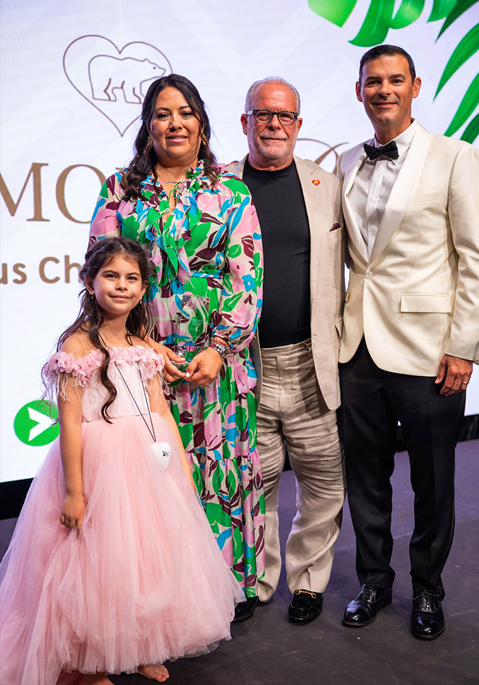 Olga and Salo Grosfeld with Peter Lopez, Board Chair of Nicklaus Children's Hospital Foundation