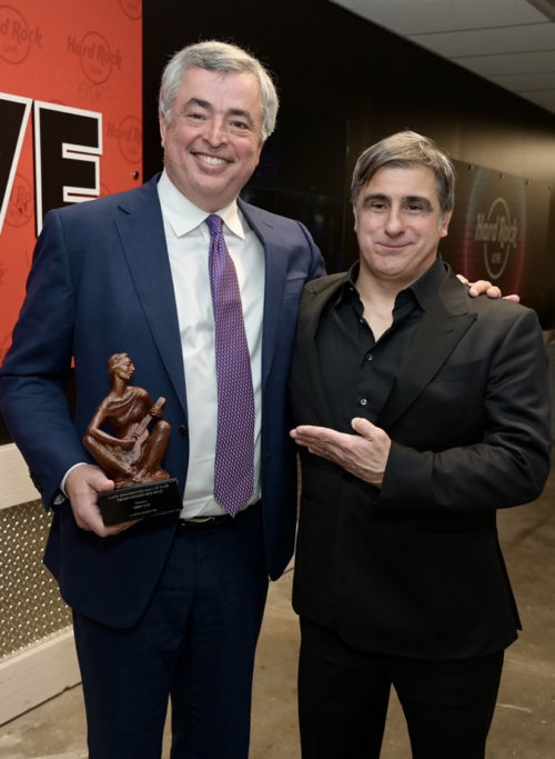 Apples’s Eddy Cue and Afo Verde at the 10th annual La Musa awards at the Hard Rock Live