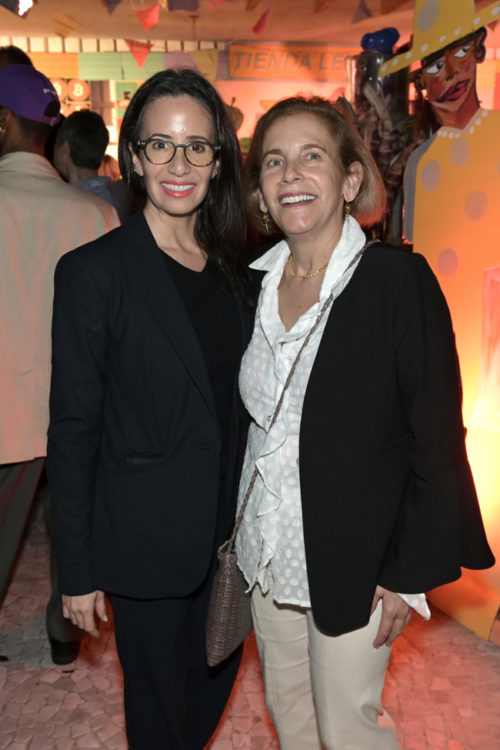 FIU's Smilka Melgoza and Frost Art Museum Director Jordana Pomeroy at the home of Mario Cader-Frech and Robert Wennett for a cocktail party premiering Chisme by Studio Lenca and honoring The Parrish Art Museum