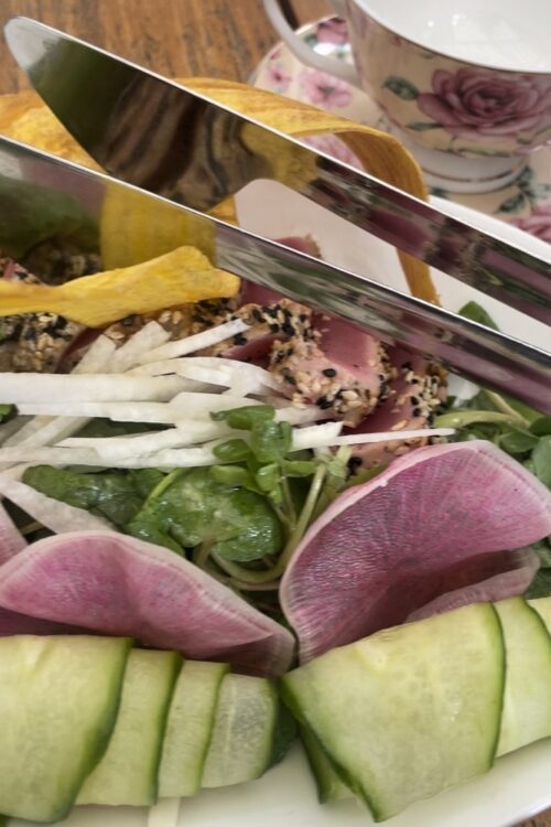 Spring Watercress Salad with Ahi Tuna, jicama, watermelon radish, cucumber, plantain and ginger passionfruit vinaigrette