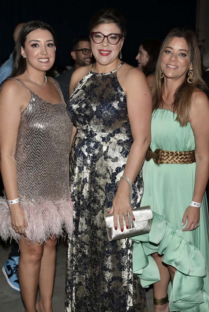 Nicole Valls, Karina Pavone, and Maggie Fresen-Zulueta at the Amigo's Night at the Hanger at Regatta Harbour in Coconut Grove