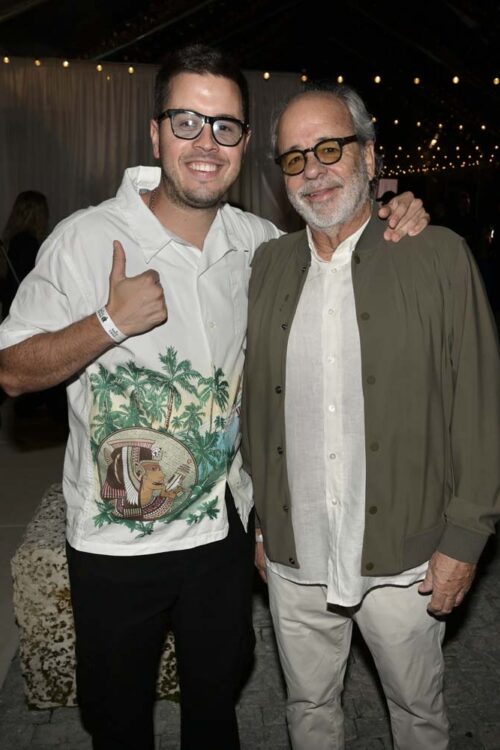 Artist Vic Garcia and his dad Rene Garcia at the Amigo's Night at the Hanger at Regatta Harbour in Coconut Grove