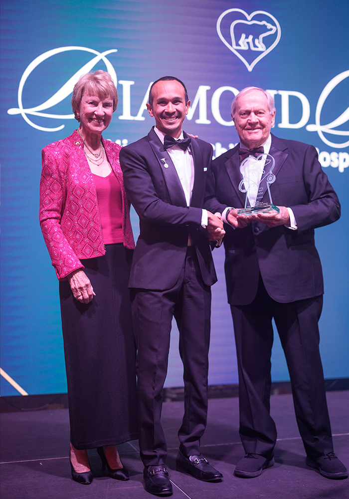 Jack and Barbara Nicklaus present Excellence in Pediatric Medicine Award to Dr. David Lowe