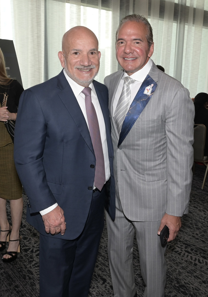 Jackson Memorial Hospital President Carlos Migoya and Cecil Milton at the Ronald McDonald House of South Florida 12 Good Men luncheon at the Loews Coral Gables