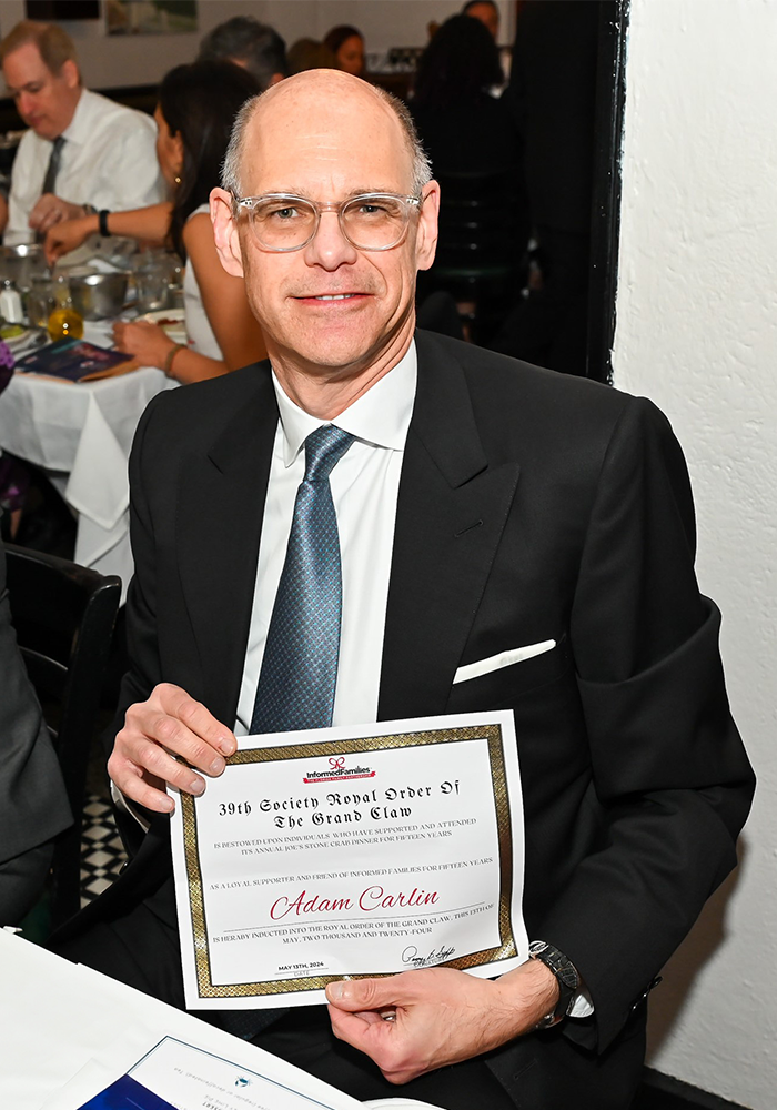 Adam Carlin, one of the recipients of the Royal Order of the Grand Claw PINS for attending IF's Dinner at Joe's for 15 years