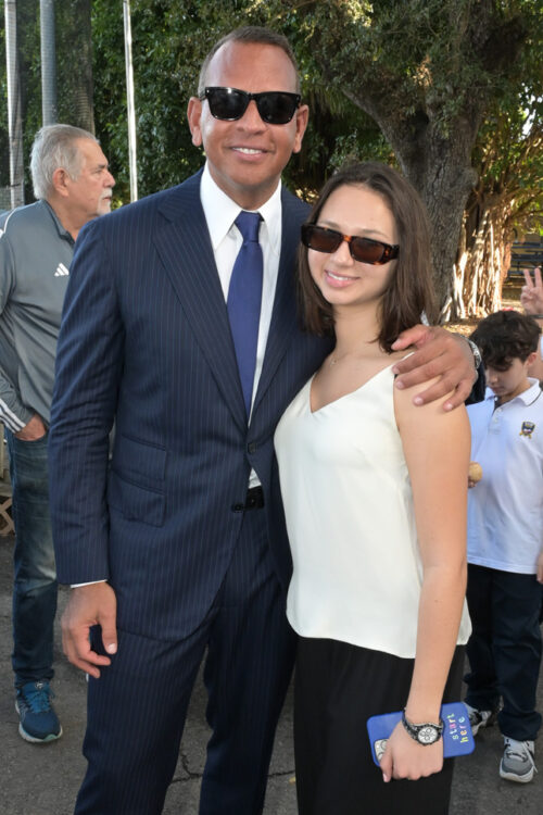 Alex Rodriguez with his daughter Natasha Rodriguez at the annual AROD Holiday Gift Giveaway at the Boys and Girls Club of Miami Dade