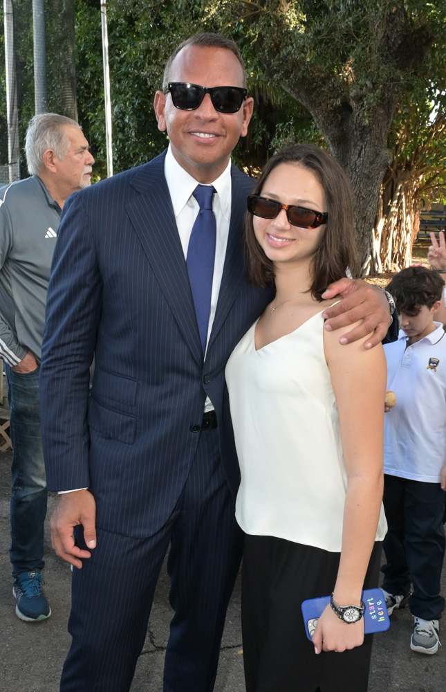 Alex Rodriguez with his daughter Natasha Rodriguez at the annual AROD Holiday Gift Giveaway at the Boys and Girls Club of Miami Dade